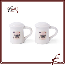 stone ware spice and petter shakers with decal pattern